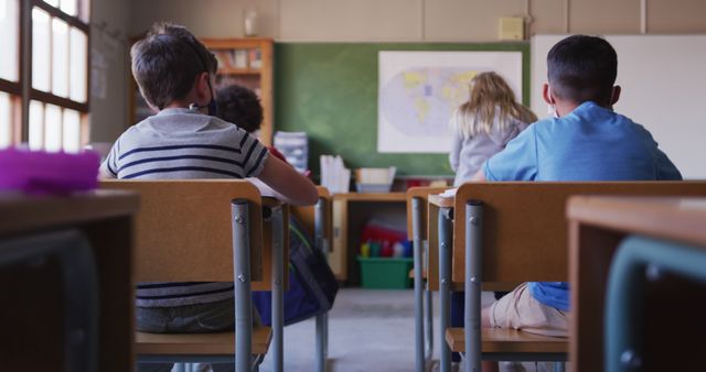 Students Sitting in Classroom During Lesson Time - Download Free Stock Images Pikwizard.com