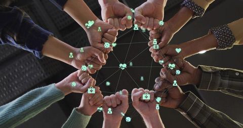 Diverse hands connected in digital network and unity
