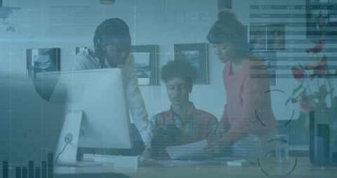 Diverse team collaborating over tablet and documents in office with analytics overlay