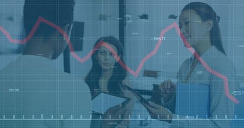 Analyzing Financial Trends with Diverse Business Team in Office