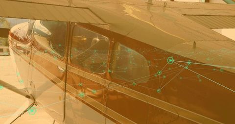Vintage cessna fuselage with teal network nodes overlay conveying aviation data insights