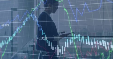 Entrepreneur Analyzing Stock Market Data with Tablet Device - Download Free Stock Images Pikwizard.com
