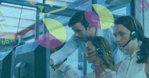 Team Collaborating with Digital Interface at Office Workstations