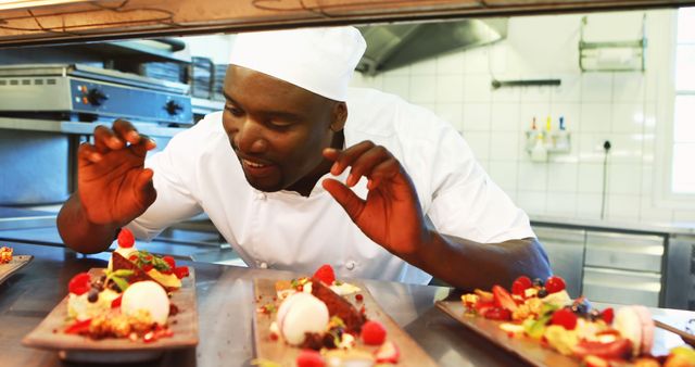 Chef Carefully Plating Beautiful Gourmet Desserts in Restaurant Kitchen - Download Free Stock Images Pikwizard.com