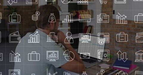 Midadult man resting chin while analyzing laptop and phone with finance icons overlaying