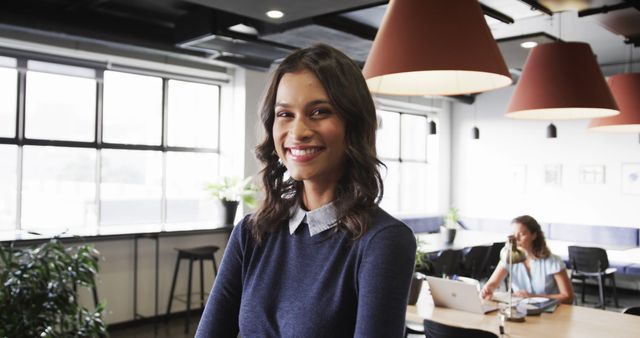 Smiling Confident Businesswoman in Modern Office - Download Free Stock Images Pikwizard.com