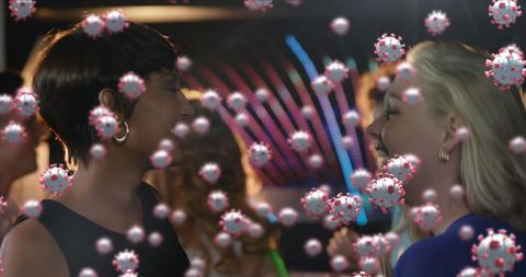Partygoers Amid COVID-19 Virus Cells Conceptual Image - Download Free Stock Images Pikwizard.com