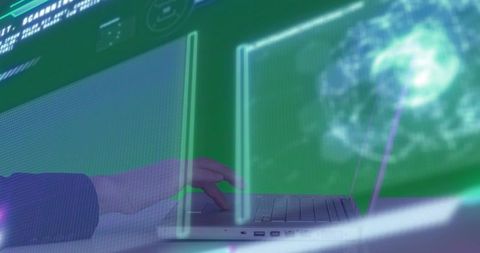 Mid-Adult Hand Typing on Laptop with Holographic Globe UI for Cybersecurity and Network Monitoring
