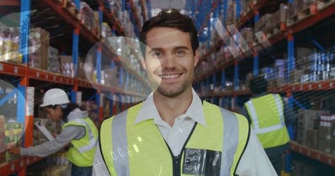Warehouse Worker Smiling with Digital Graphs Overlaid on Shelves - Download Free Stock Images Pikwizard.com