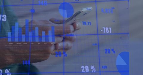 Mid-adult hand holding smartphone and scrolling with blue financial charts overlay