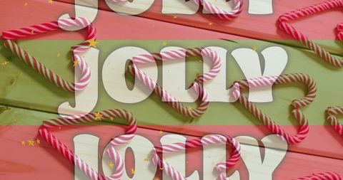 Festive Jolly Text on Red and Green Striped Wooden Planks with Candy Canes