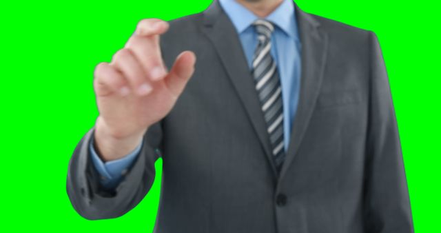 Businessman interacting with virtual interface green screen background - Download Free Stock Images Pikwizard.com