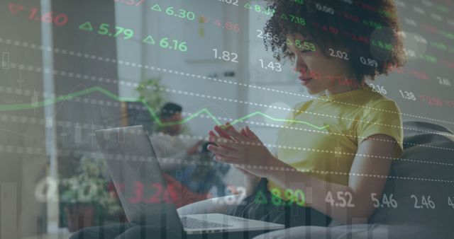 Young Woman Analyzing Stock Market Data on Laptop at Home - Download Free Stock Images Pikwizard.com