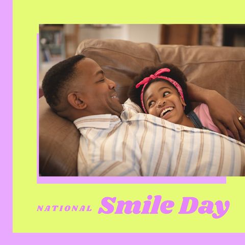 Father and Daughter Celebrating National Smile Day at Home