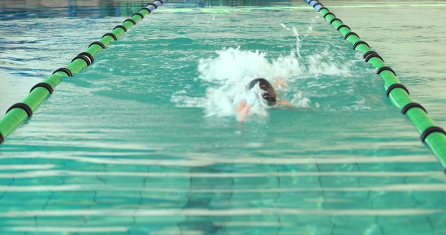 Focused Swimmer in Competition Pool Practicing Freestyle Stroke - Download Free Stock Images Pikwizard.com