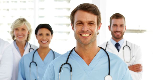 Smiling Group of Medical Professionals in Hospital Setting - Download Free Stock Images Pikwizard.com