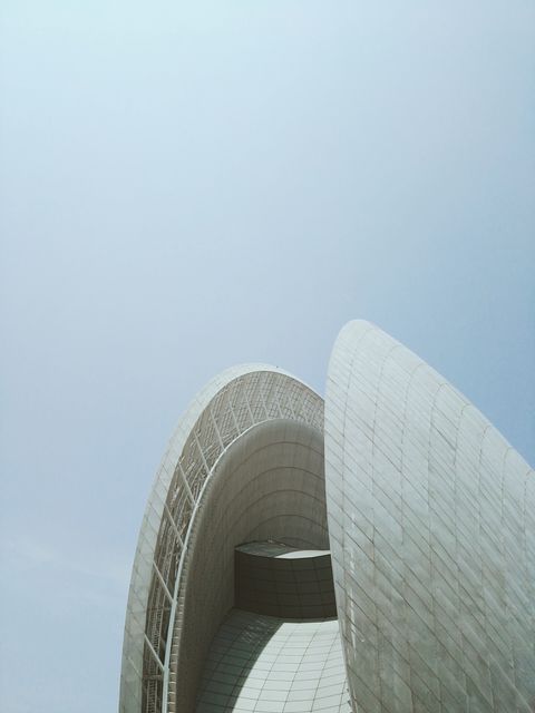 Modern Architectural Structure Against Clear Blue Sky - Download Free Stock Photos Pikwizard.com