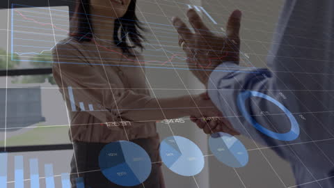Business Professionals Handshake with Data and Statistics Overlay