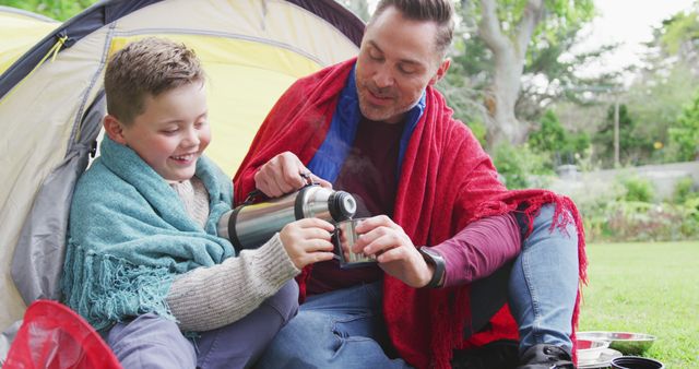 Father and Son Enjoying Tea While Camping in Backyard - Download Free Stock Images Pikwizard.com