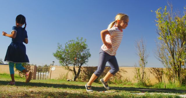 Children Playing Tag Outdoors on a Sunny Day - Download Free Stock Images Pikwizard.com