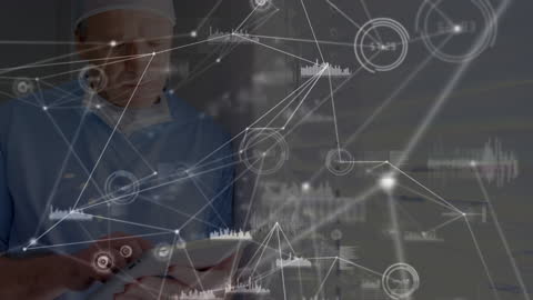 Surgeon Utilizing Tablet with Digital Network Overlay