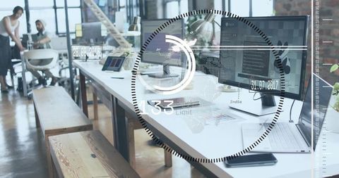 Open-plan tech workspace with hud data overlay, collaborative team working at modern desks