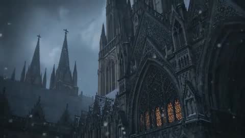 Camera panning Gothic cathedral facade with spires lit stained-glass windows falling snow