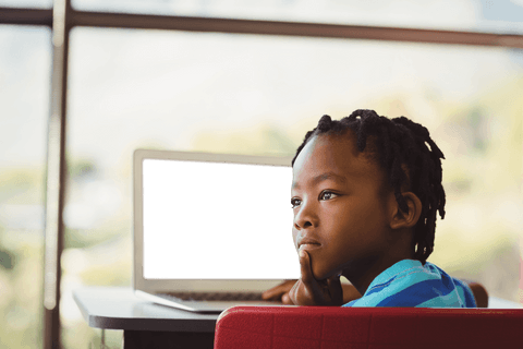 transparent cutout: thoughtful boy by laptop in classroom - Download Free Stock Videos Pikwizard.com