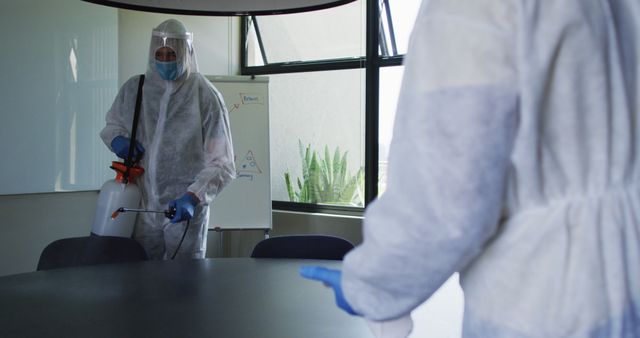 Disinfection Team Cleaning Office Meeting Room to Prevent Virus Spread - Download Free Stock Images Pikwizard.com