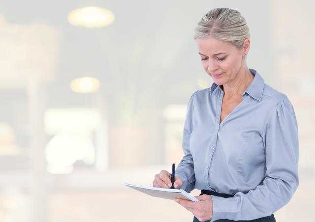 Businesswoman on tablet with bright background - Download Free Stock Photos Pikwizard.com