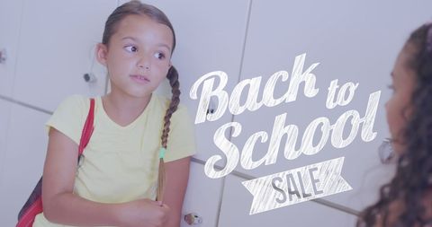 Back to School Sale with Happy Schoolgirls by Lockers