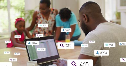 Businessman Analyzing Social Media Data with Family, Concept of Work-Life Balance