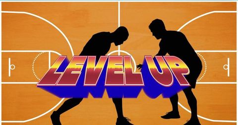 Silhouetted basketball players with level up text on court