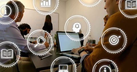 Diverse Team Collaborating with Digital interface in Office Setting