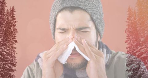 Man Sneezing With Tissues During Winter Season - Download Free Stock Images Pikwizard.com
