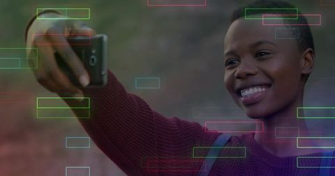 Smiling Woman Taking Selfie in Nature with Colorful Digital Effects