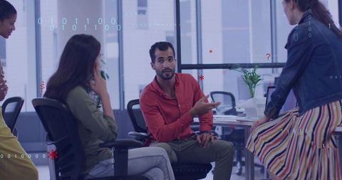 Confident Hispanic Leader Facilitating Progressive Office Meeting