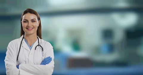 Confident Female Doctor Standing in Hospital Environment - Download Free Stock Images Pikwizard.com