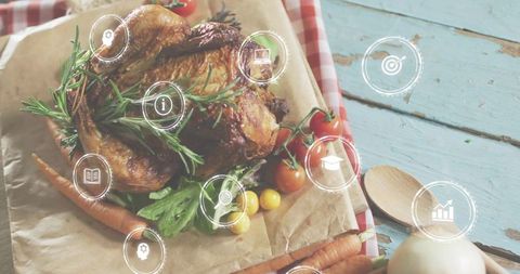Roast chicken showcasing digital HUD overlays on rustic blue table with rosemary, tomatoes