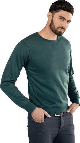 Transparent portrait of man wearing green sweater posing with hands in pocket