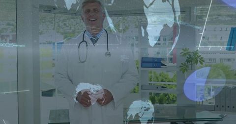 Smiling male doctor standing in modern clinic with digital world map overlay and stethoscope