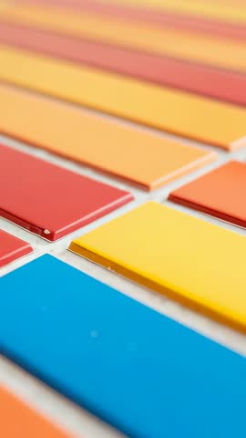 Vertical panning reveal over vibrant tile grid pattern for modern abstract backgrounds