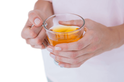 transparent background: woman holding warm glass of tea close-up - Download Free Stock Videos Pikwizard.com