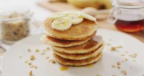 Delicious Fluffy Pancakes with Sliced Bananas and Maple Syrup - Download Free Stock Images Pikwizard.com