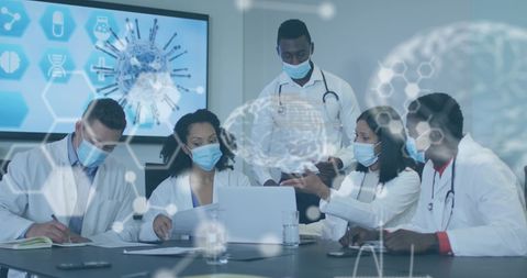 Multiethnic Team of Doctors Collaborating with Digital Medical Data