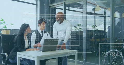 Diverse Team Collaborating in Modern Office with Data Annotations