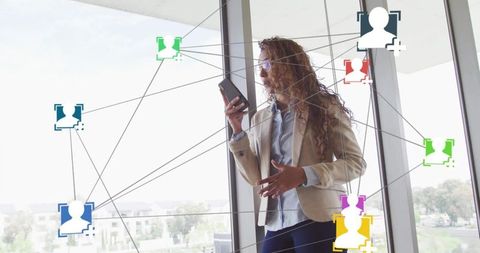 Businesswoman Communicating with Digital Interface and Media Icons