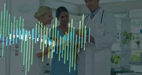 Healthcare Professionals Analyzing Data on Digital Tablet