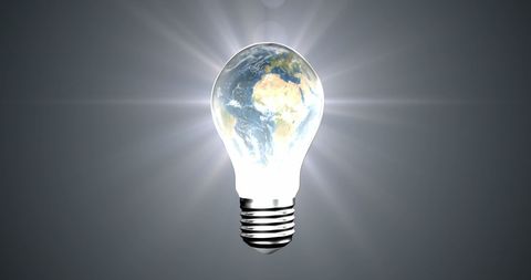 Globe Within Light Bulb Symbolizing Global Innovation