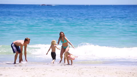 Joyful Family Bonding on Sunny Beach